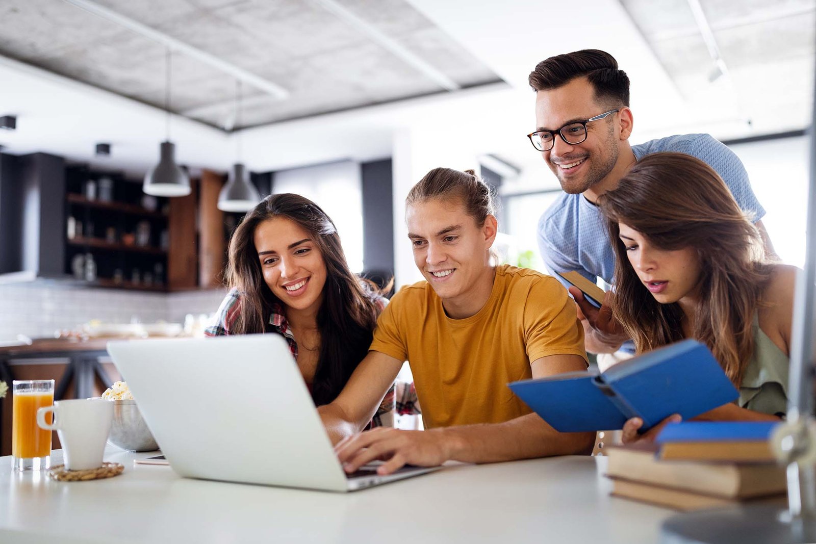 happy-group-of-young-students-studying-together-6Y7CSKY.jpg