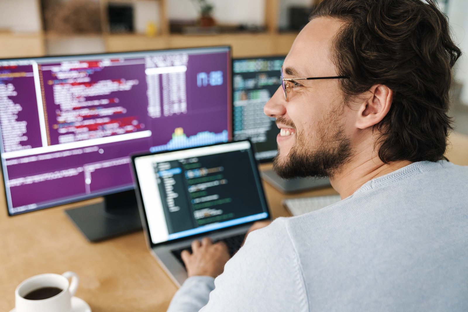 image-of-programmer-man-wearing-eyeglasses-working-RP2YDGV.jpg